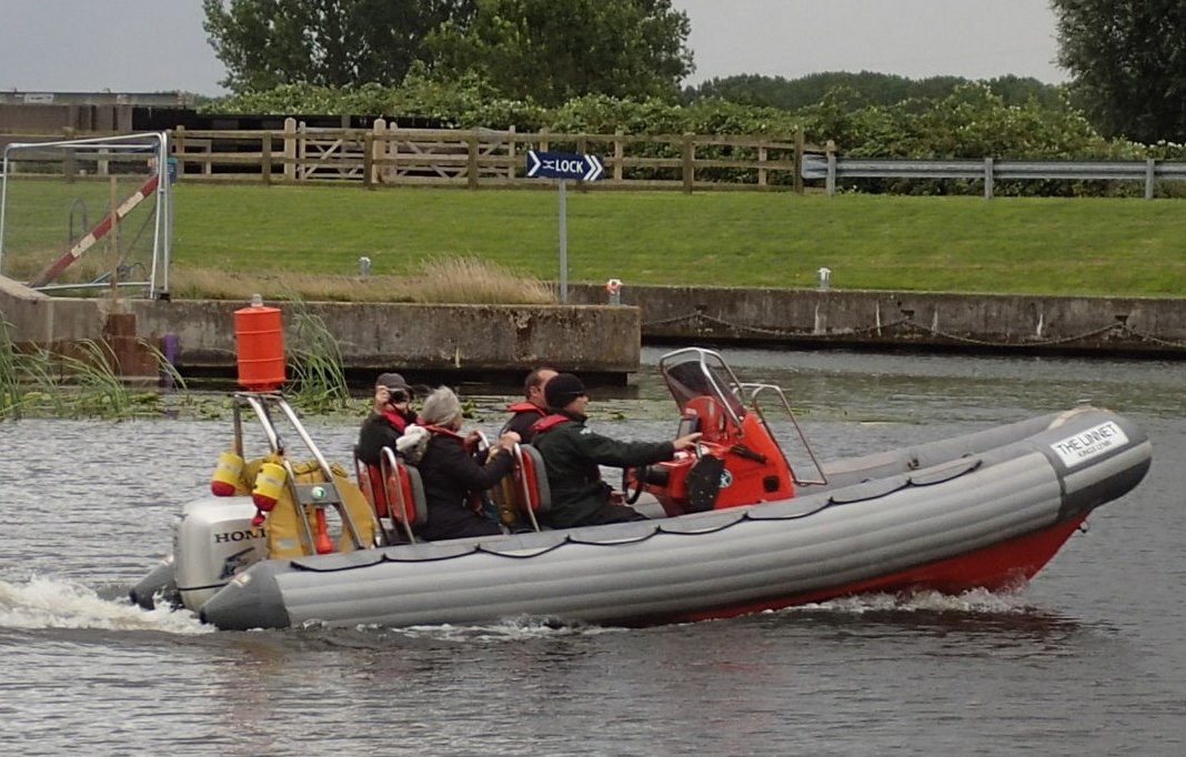 zoomimg along in a speedboat
